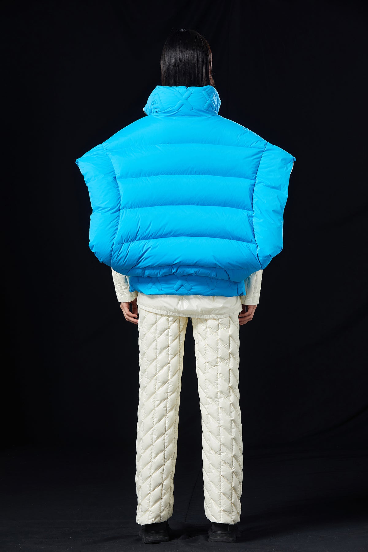 DECONSTRUCTION STYLE IS SYMMETRICAL GOOSE DOWN VEST